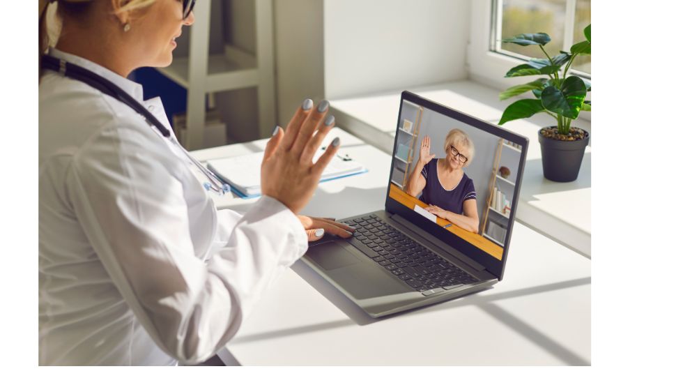 Doctor talking to patient via video chat